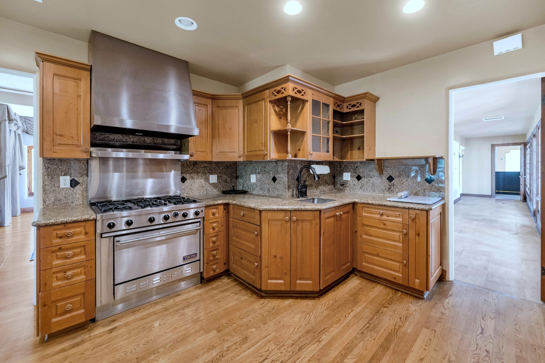 Kitchen with wood cabinetry and island